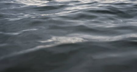 Background of calm sea water surfaceの写真素材