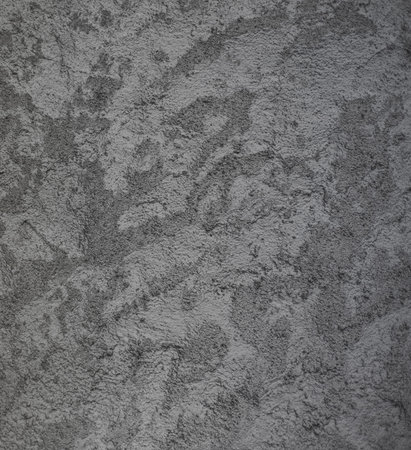 Background close up of a plastered wall of a traditional French house.の写真素材