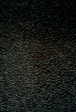 Close up view of cracked glass.の写真素材