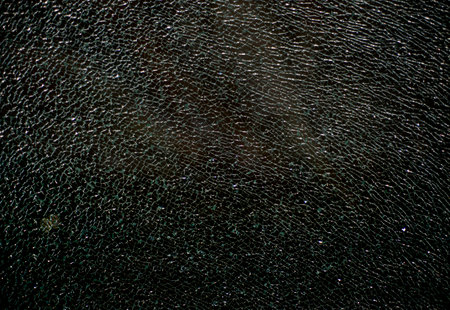 Close up view of cracked glass.の写真素材