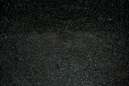 Close up view of cracked glass.の写真素材