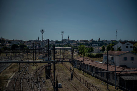 Top view of rail tracks with a view of the French town of AngoulÃªme in the background.の写真素材