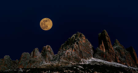 Full moon in the Dolomites, Tre Cime di Lavaredo.の写真素材