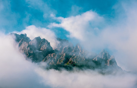 Clouds over mountain peaks in the Dolomites, Italy.の写真素材