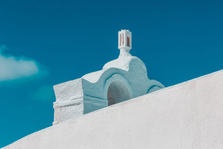 Tower of a church on Santorini island, Greece.