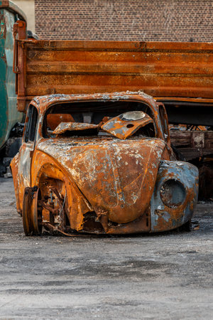 rusted burnt out car wrecks.