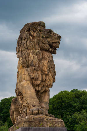 The monumental lion atop the Gileppe Damの写真素材