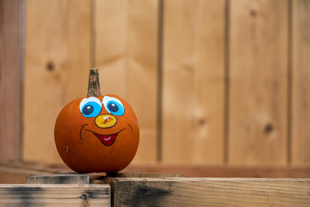 Pumpkin face on a boxの写真素材