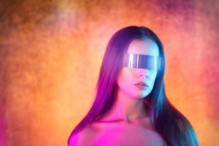 Portrait shot of a pretty young woman in RGB colors.