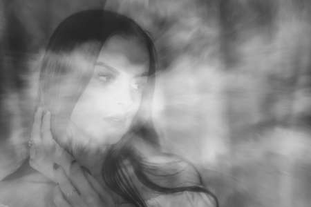 Surreal blurry portrait Portrait of a young beautiful womanの写真素材