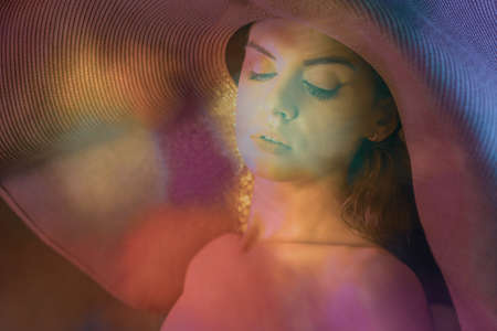 Portrait shot of a pretty young woman, Surreal blurry portrait.の写真素材