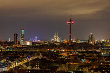Cologne cityscape at night, Germany. View of Cologne Cathedral and Colonius TV Tower.の写真素材