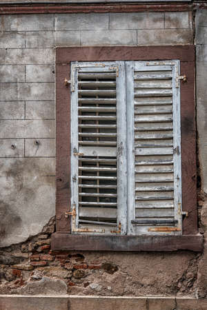 Old house facade with window.の写真素材