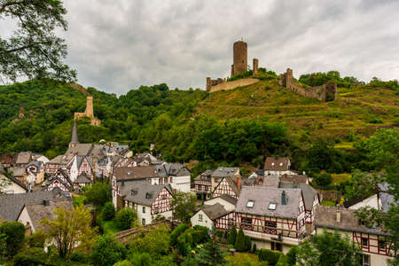 Half-timbered village of Monreal, the most beautiful village in the Eifel, Germany. View of Monreal Castle.のeditorial素材