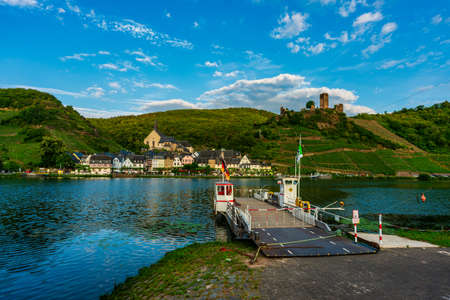 Panorama view from the opposite bank of the Moselle on Beilstein with Metternich Castle, Germany.のeditorial素材