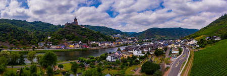 Panorama of Cochem with the Reichsburg Cochem, Germany. Drone photography. Created from several images to create a panorama image.のeditorial素材