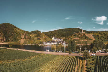 Panoramic view of the Moselle vineyards near Beilstein, Germany. Metternich Castle above the Moselle river. Drone photography.のeditorial素材