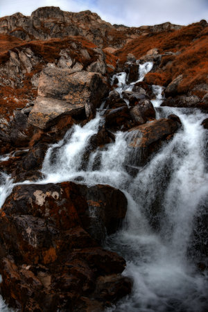 small waterfall in Switzerlandの写真素材