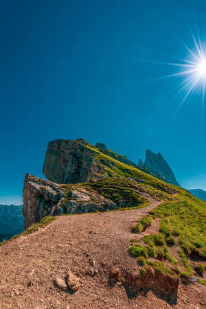 sunbeams over the Seceda, a high mountain in the Dolomites in South Tyrol, Italy.の写真素材