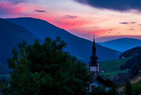 Sunrise in the Dolomites, Italy. San Pietro in Val di Funes.の写真素材