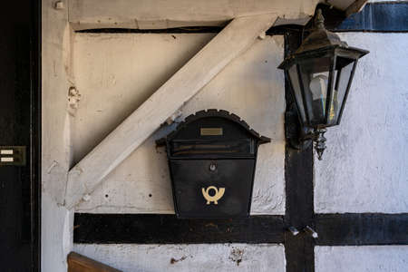 Old lantern and mailbox on the wall.の写真素材