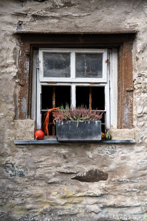 window in an old houseの写真素材