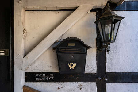 Old lantern and mailbox on the wall.の写真素材