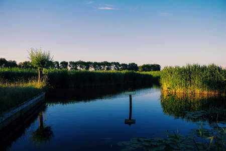 Reflection on the water in The Netherlandsの写真素材