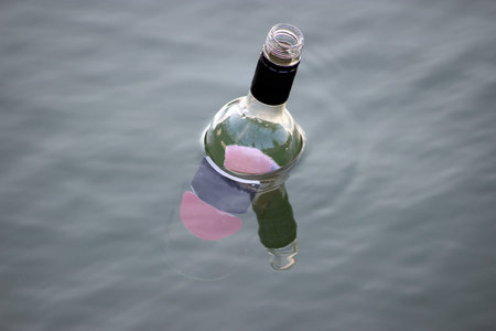 Closeup Shot of a Bottle in the Waterの写真素材