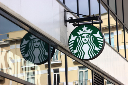 Monte-Carlo, Monaco - March 9, 2016: Starbucks Sign is Displayed at the Facade of a Starbucks Store. Starbucks Corporation is an American Coffee Company and the Largest Coffeehouse Company in the world with 23,450 Stores in 67 Countriesのeditorial素材