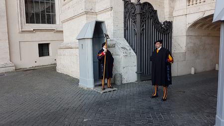 Vatican City, Vatican - February 11, 2018: Pontifical Swiss Guard, Swiss Guard Or Papal Swiss Guards Standing At Gate Of Vaticanのeditorial素材