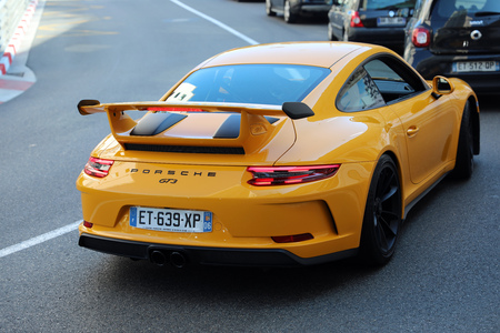 Monte-Carlo, Monaco - April 21, 2018: Luxury Yellow Porsche 911 GT3 (Rear View) In The Street Of Monaco On The French Rivieraのeditorial素材