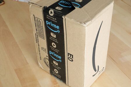 Roquebrune-Cap-Martin, France, September 5, 2018: Amazon Package Box Cardboard Delivery From Amazon Prime, Closeup View. Amazon Prime Is A Paid Subscription Service Offered By Amazon.comのeditorial素材