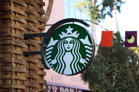 Chessy, France - October 13, 2018: Starbucks Sign Is Displayed At The Facade Of A Starbucks Store. Starbucks Corporation Is An American Coffee Company And The Largest Coffeehouse Company In The World With 28,278 Stores In 76 Countriesのeditorial素材