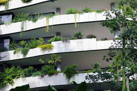 Modern Architecture And Ecologic Skyscrapers With Much Green Plants And Beautiful Trees On Every Balconyの写真素材
