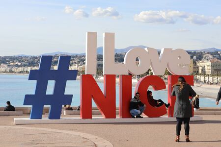 Nice, France - January 29, 2019: Large Letters With Hashtag Sign I LOVE NICE, Logo Symbol On Mediterranean Sea View And Cityscape Of Nice City, French Riviera, France, Europeのeditorial素材