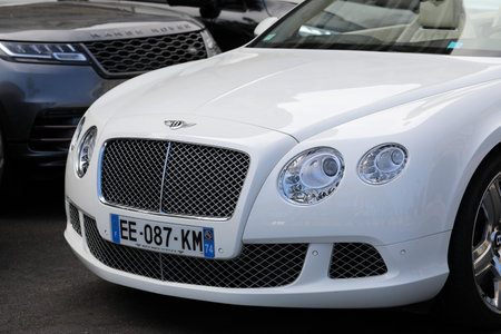 Monte-Carlo, Monaco - June 16 2019: Luxury English Cars, White Bentley Continental GT And Black Land...