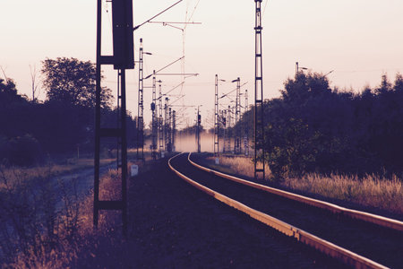 Misty sunset at the railway.