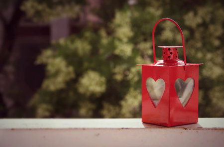 Storm lamp of love. Nice lamp with red hearts.の写真素材