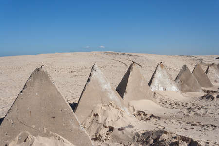 Concrete blocks at edge of duneの写真素材