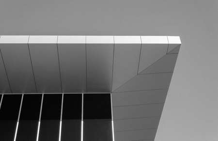 Generic office building corner against clear skyの写真素材