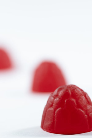 Raspberries on white background in portait layout