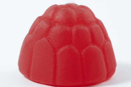 Extreme closeup of raspberry candyの写真素材