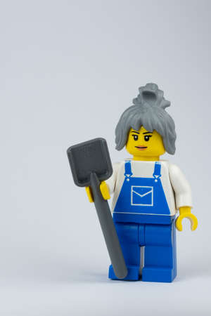NEWCASTLE, NSW/ AUSTRALIA - March 23 2019: Close up image of lego minifigure posing as a builder against a white backgroundのeditorial素材
