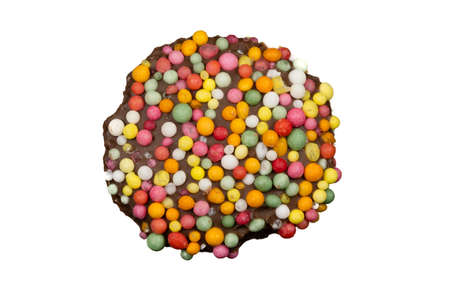 Macro image of a 'freckle', chocolate bud coated in sprinkles, isolated on a white backgroundの写真素材