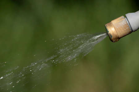 Spray nozzle releasing liquidの写真素材