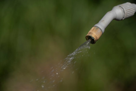 Spray nozzle releasing liquidの写真素材