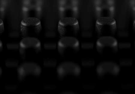 Macro image of the nodules of a black rubber coin matの写真素材