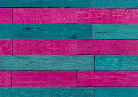 Vintage set of Pink and Blue Cuisenaire rods in a horizontal patternの写真素材