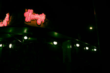 SYDNEY, AUSTRALIA - June 30 2019 Harry's CafÃ© de Wheels sign at Wooloomooloo at nightのeditorial素材